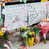 Flowers and messages are placed at a memorial for victims of the mass killing on April 24, 2018 in Toronto, Canada.