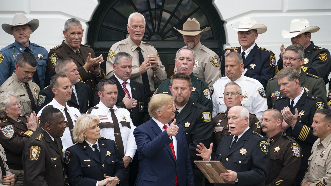 President Donald J. Trump gives a thumbs-up as he is presented with a plaque of recognition by “The Nation’s Sheriffs,” Thursday, Sept. 26, 2019, at the South Portico of the White House. (Official White House Photo by Joyce N. Boghosian)