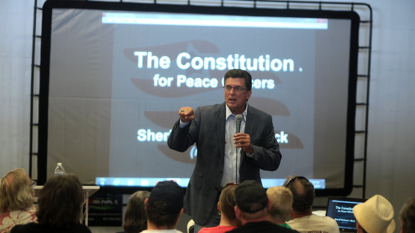 CSPOA founder former sheriff Richard Mack speaking at the 2014 PrepperFest Expo at WestWorld in Scottsdale, Arizona on October 26, 2014. (Credit: Gage Skidmore/Flickr)