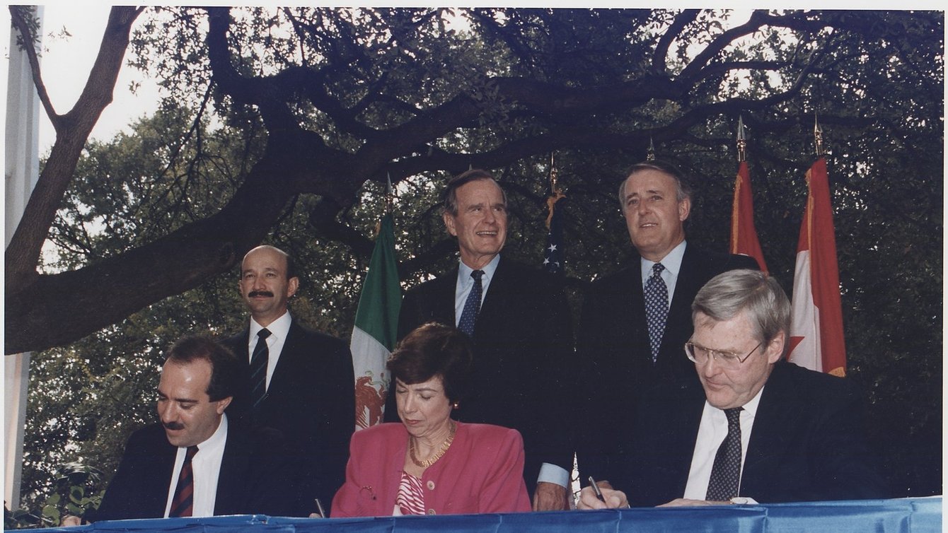 President Bush, Canadian Prime Minister Brian Mulroney and Mexican President Carlos Salinas participate in the initialing ceremony of the North American Free Trade Agreement in San Antonio, Texas.