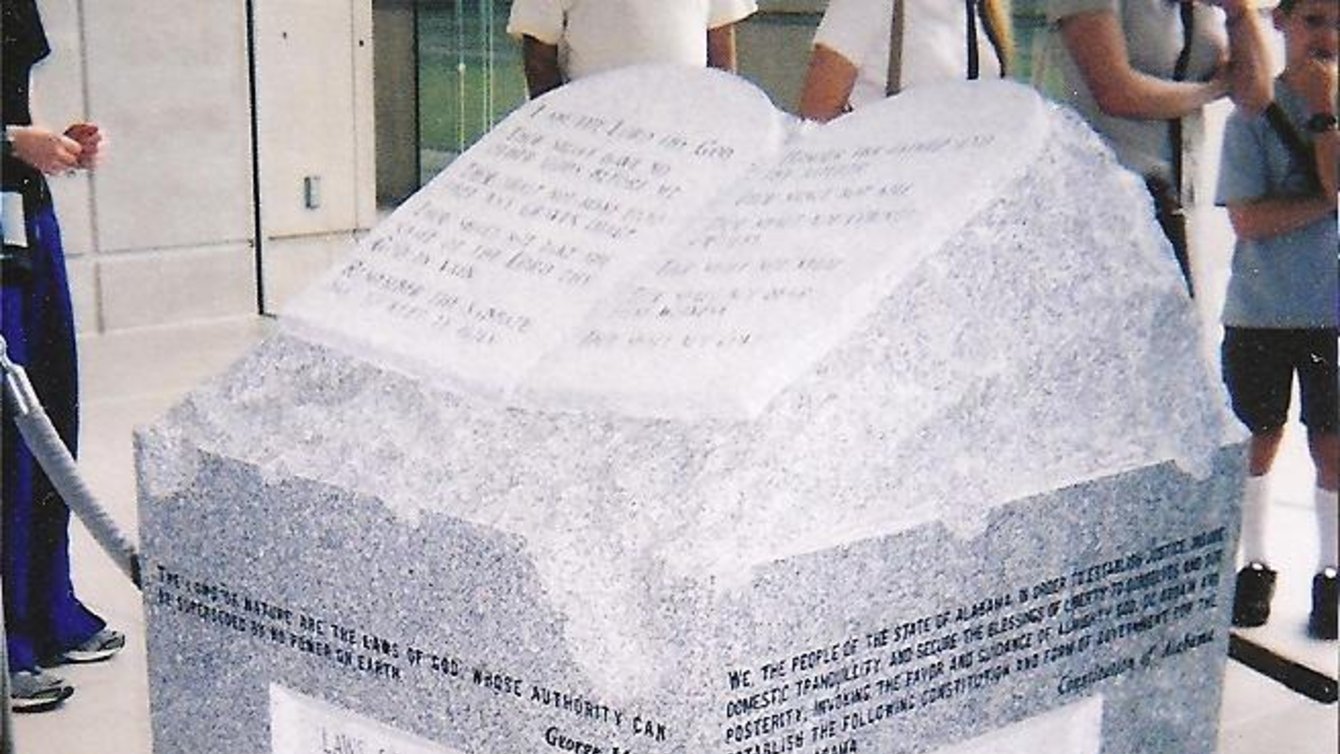 A stone slab with inscriptions on it.