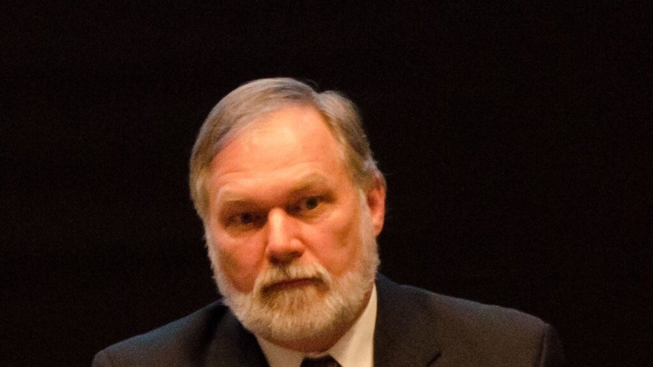 Scott Lively speaking into a mic