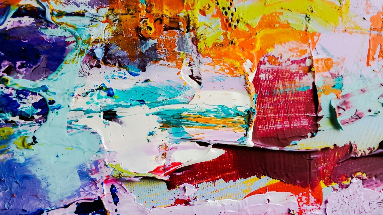 Colorful abstract image of thick application of oil paint