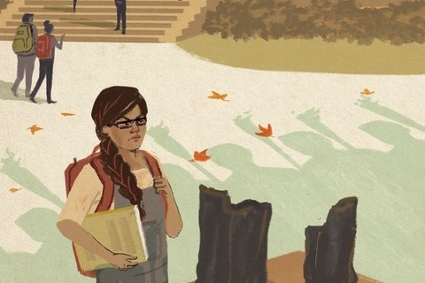 A student looks at the remaining boots of a toppled statue.