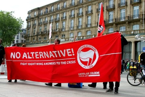 A red banner that reads "No Alternative! Fight Right Wing Answers to the Crisis"