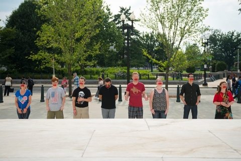 People standing at a stage