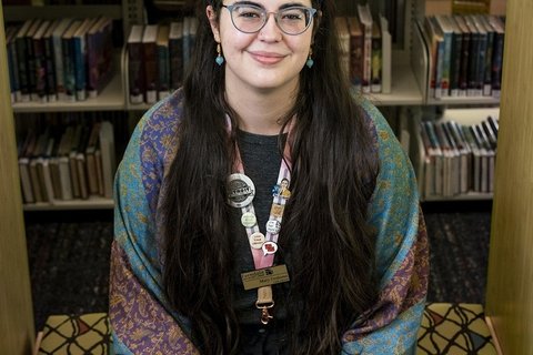 A white woman with black hair.