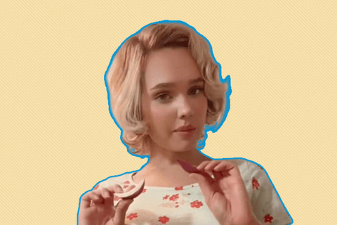 a white woman in a floral dress on a yellow background