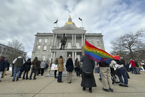 LGBTQ advocates in front of the New Hampshire state house.