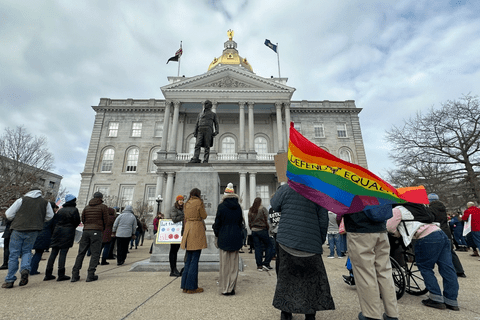 LGBTQ advocates in front of the New Hampshire state house.