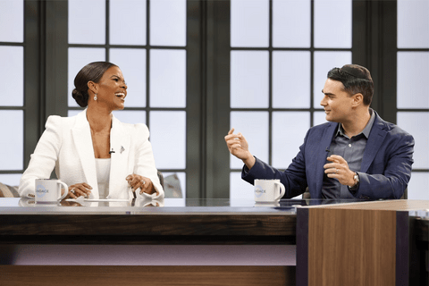 Candace Owens and Ben Shapiro laughing over a table