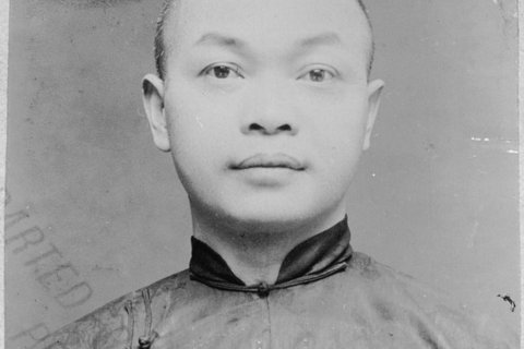 a black and white image of a man.