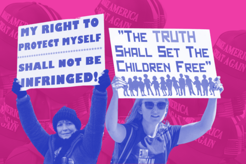 Two protestors with signs
