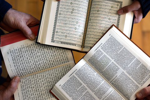 Books open on a table