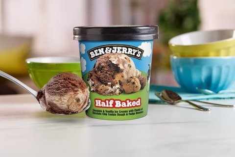 A pin of Ben and Jerry's "Half Baked" ice cream on a table