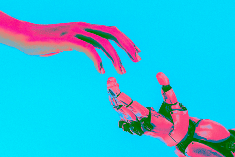 human hand reaches for robot hand