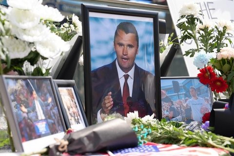 memorial photos of Kirk in Seoul