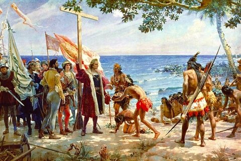 A painting depicts Columbus holding a giant cross as he lands in the Bahamas