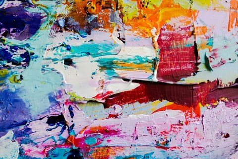 Colorful abstract image of thick application of oil paint