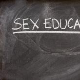 Chalkboard with text that reads "Sex Education"