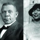 A Black man in a suit, and a Black woman in a dress and a hat
