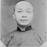 a black and white image of a man.