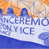 Protestors holding a banner that advocates against ICE and big tech
