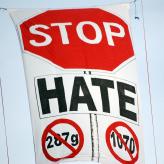 A banner that reads "Stop Hate" and crosses out 287g and 1070