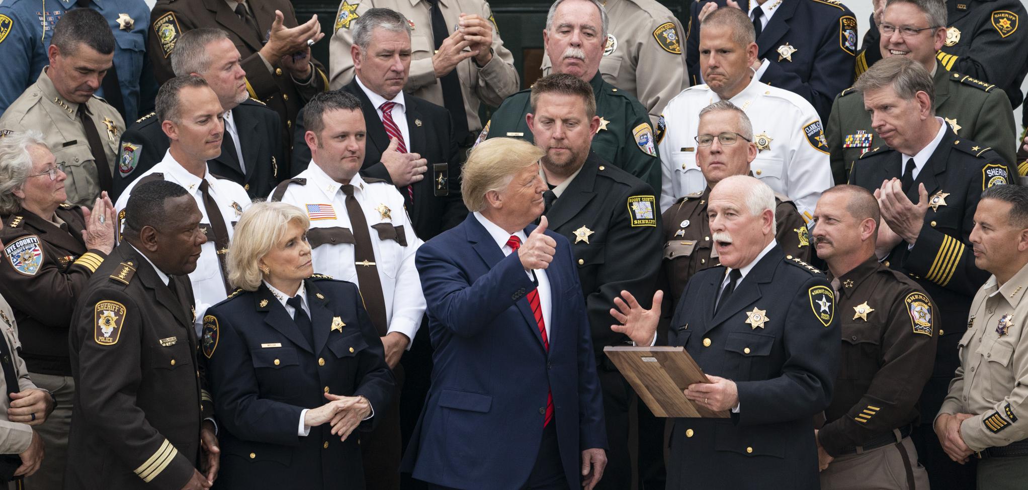 President Donald J. Trump gives a thumbs-up as he is presented with a plaque of recognition by “The Nation’s Sheriffs,” Thursday, Sept. 26, 2019, at the South Portico of the White House. (Official White House Photo by Joyce N. Boghosian)