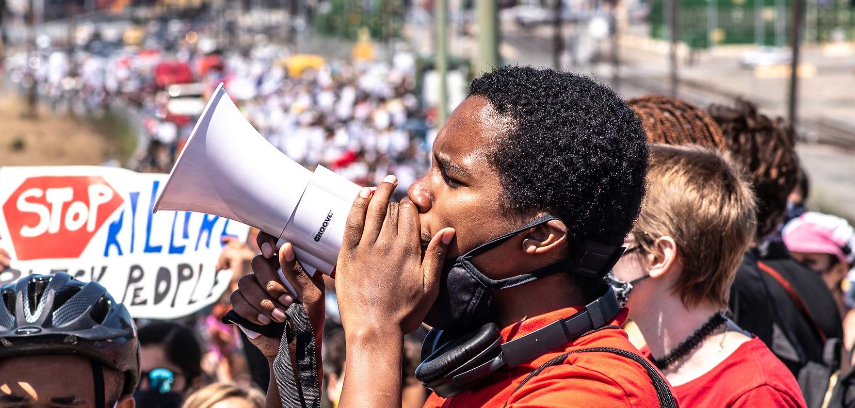 Protest organizer with a bullhorn