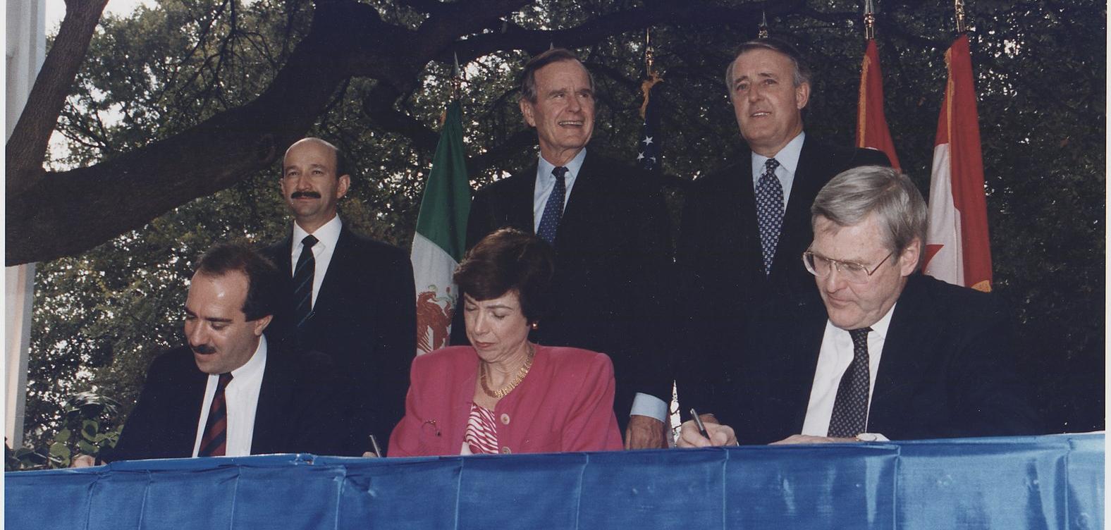 President Bush, Canadian Prime Minister Brian Mulroney and Mexican President Carlos Salinas participate in the initialing ceremony of the North American Free Trade Agreement in San Antonio, Texas.
