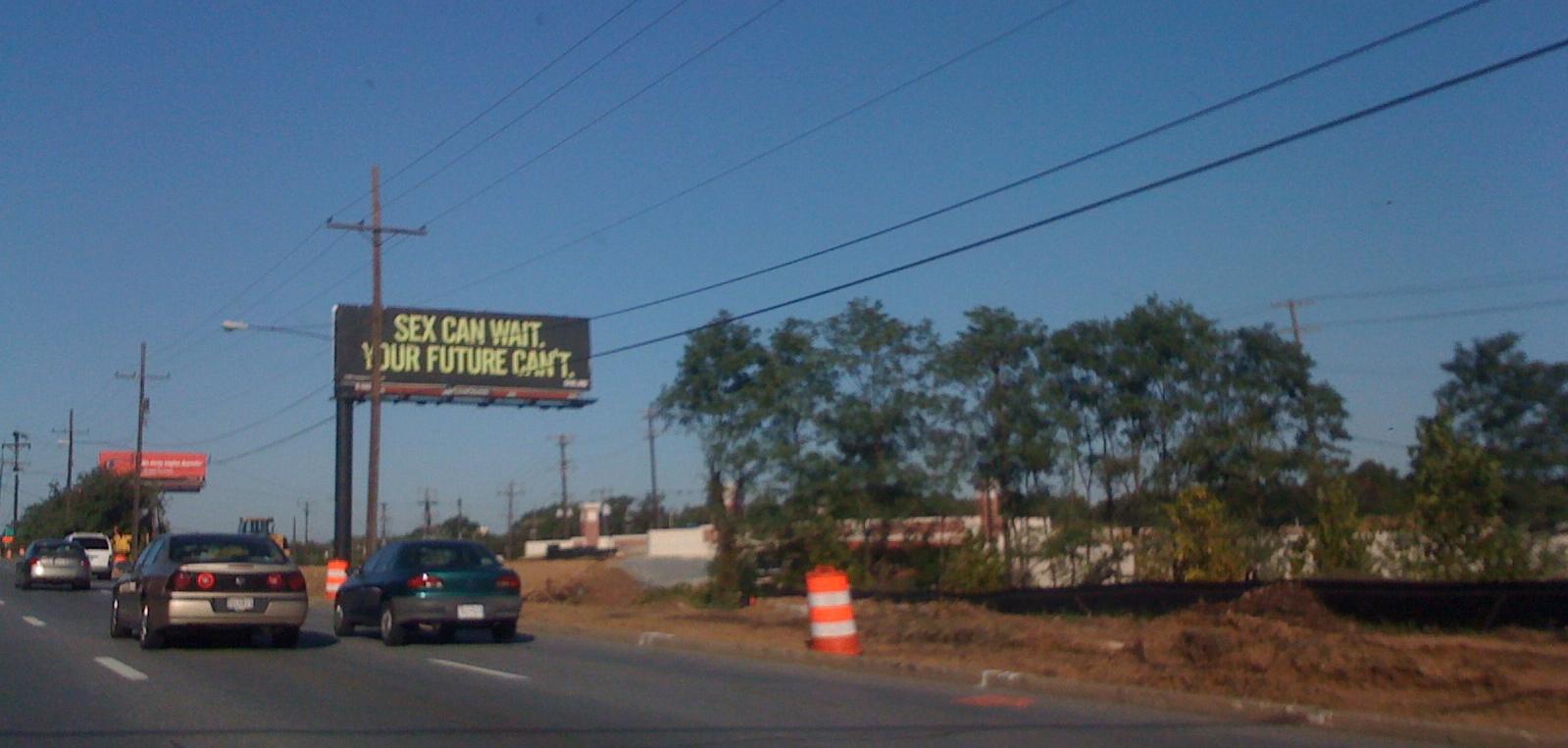 A sign board that says "Sex can wait. Your Future Can't"