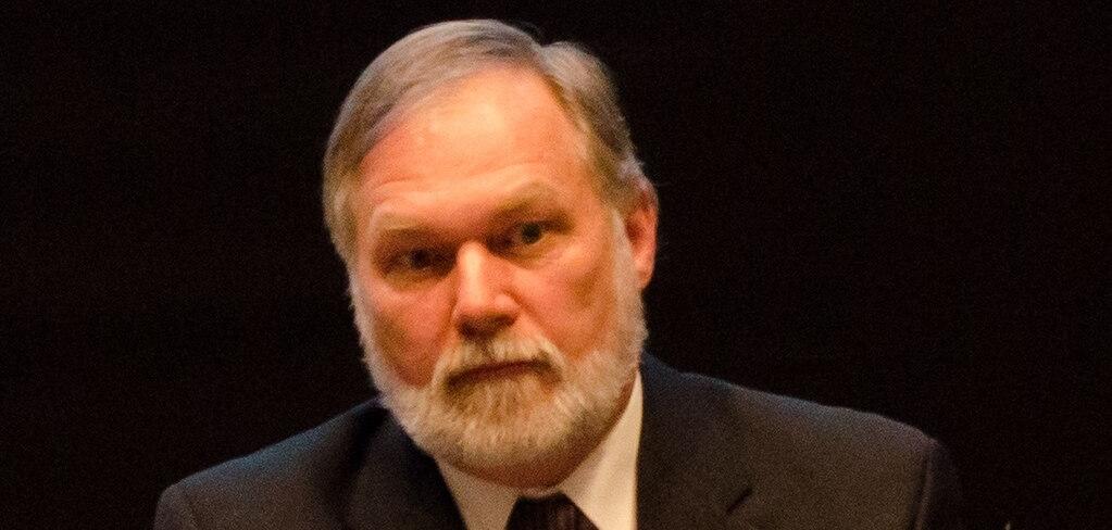 Scott Lively speaking into a mic