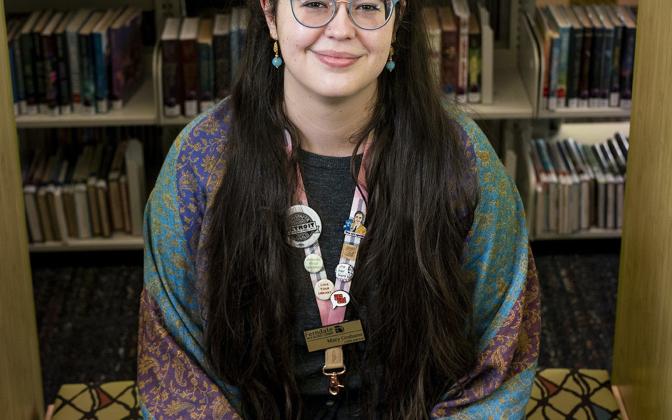 A white woman with black hair.