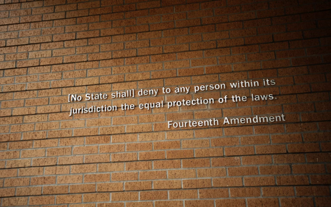 a brick wall with part of the fourteenth amendment on it.